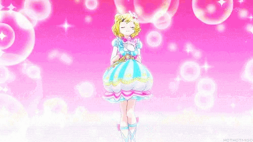 a girl in a blue and white striped dress with a bunny headband