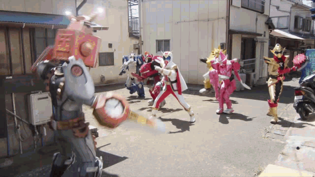 a group of cartoon characters are standing on a street with a motorcycle in the background