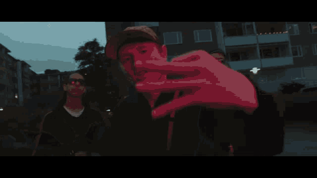 a man taking a picture of himself with his hand