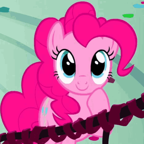 pinkie pie from my little pony is smiling while holding a rope