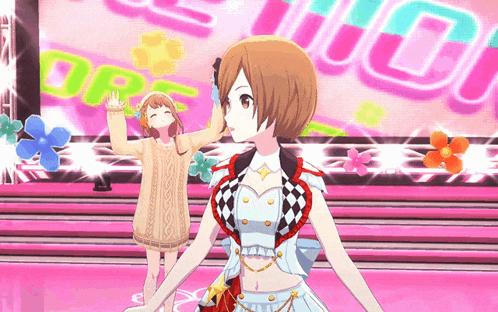 two anime girls are standing on a stage in front of a screen that says open