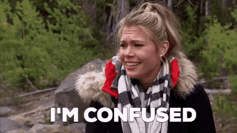 a woman in a fur coat is crying and saying `` i 'm confused '' while standing in the woods .
