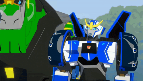 a blue and white robot with the word transformers on the front