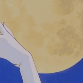 a close up of a sailor moon cartoon character