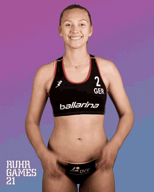 a woman wearing a black top that says ballerina on it