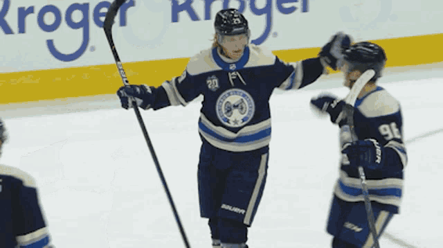a hockey player wearing a jersey with the number 20 on it