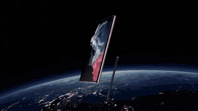 a close up of a pink phone with the word samsung on it