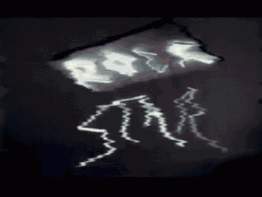 a black and white photo of lightning strikes on a wall