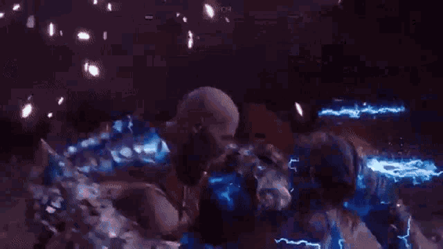 a person is flying through the air with a lightning bolt coming out of their mouth .