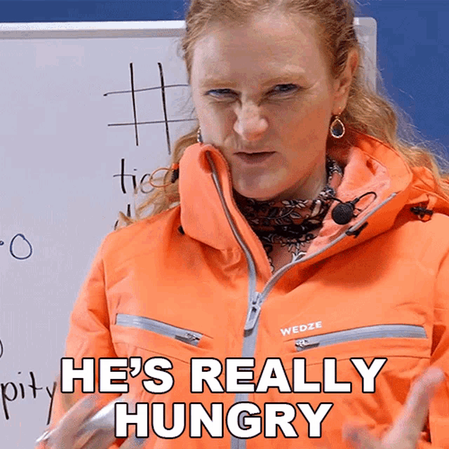 a woman in a wedze jacket says he 's really hungry