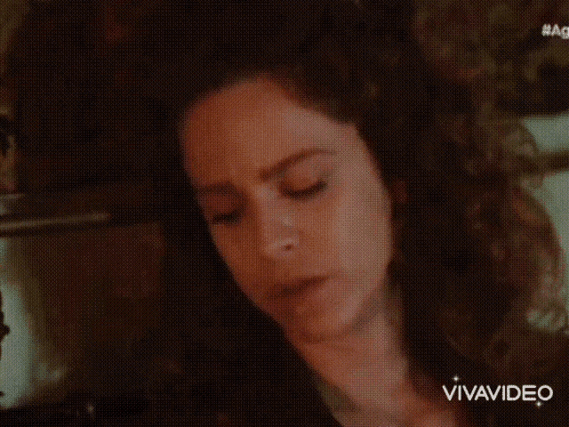 a close up of a woman 's face with the words vivavideo visible