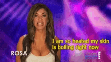 a woman says i am so heated my skin is bolling right now