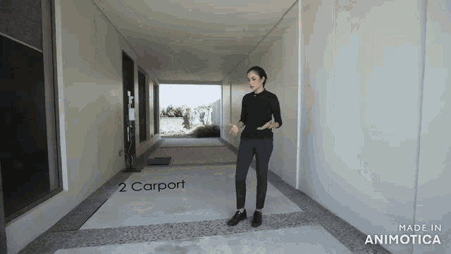 a woman is standing in a hallway with the words 2 carport written on the floor