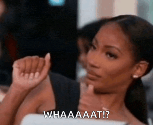 a woman with a ponytail says whaaaat