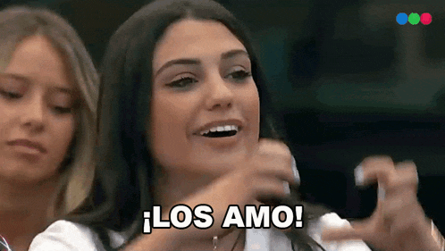 a woman is smiling with the words los amo written on her face