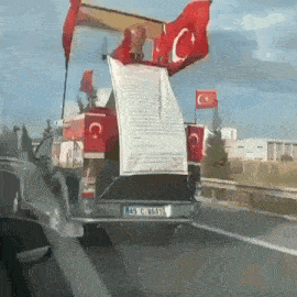 a truck with a license plate that says 45 c 8653 is driving down a highway