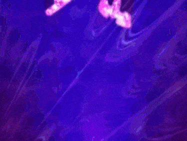 a close up of a purple background with a swirl