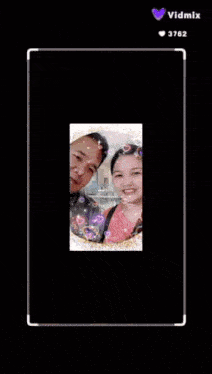 a video of a man and a woman is being displayed on vidmix