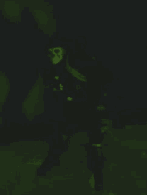 a blurred image of a person with a mask on their face