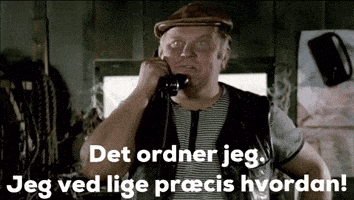 a man in a hat is talking on a phone with the words det ordner jeg