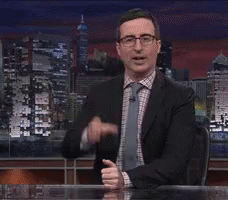 Cheers John Oliver GIF - Cheers John Oliver Drink GIFs