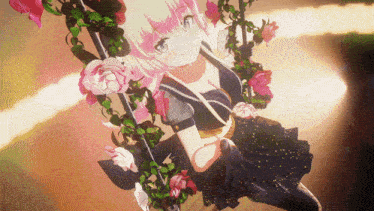 a girl is sitting on a swing surrounded by pink roses