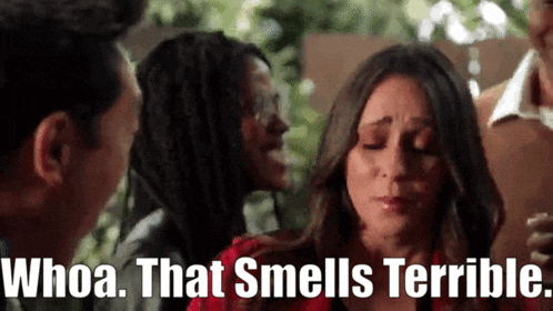 a woman crying with the words whoa that smells terrible
