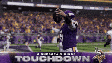 a minnesota vikings football player throws a football