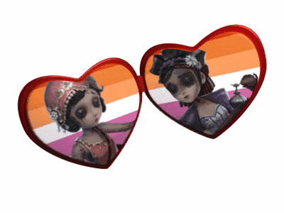 two red hearts with a picture of a woman on them