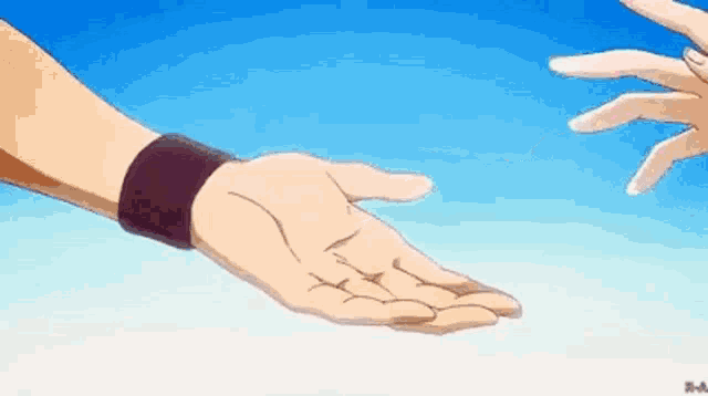 a person is reaching out their hand towards another person 's hand .