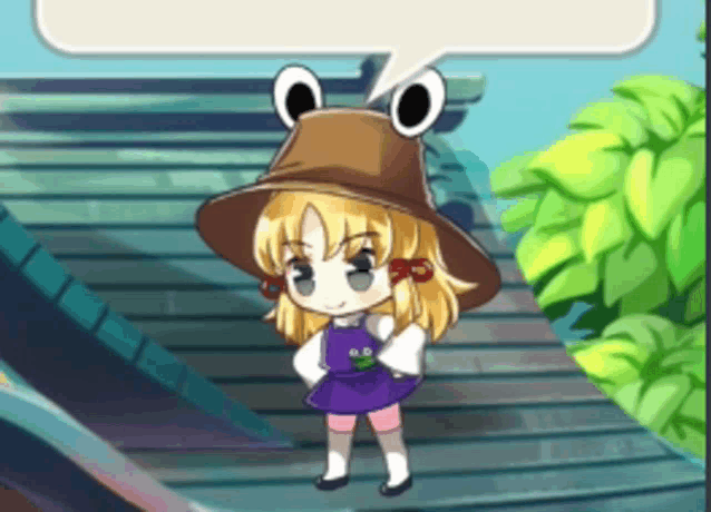 a little girl wearing a frog hat with a speech bubble