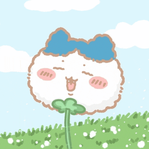 a cartoon drawing of a flower with a blue bow on it