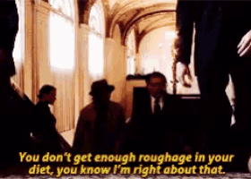 a group of people sitting in a hallway with a caption that says you don 't get enough