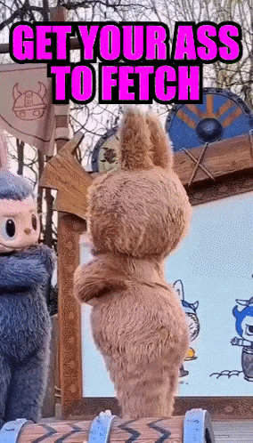 a stuffed animal with the words get your ass to fetch written on it