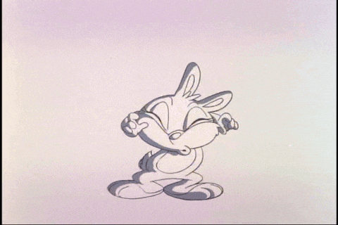 a black and white drawing of a rabbit with a big smile on his face .