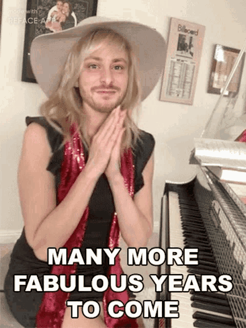 a man with a beard is sitting in front of a piano with the words many more fabulous years to come