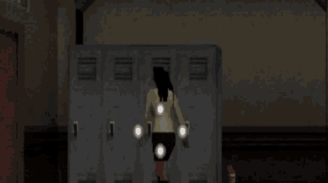 a woman is running away from a man with a knife in front of lockers