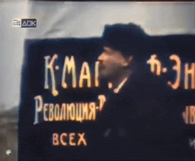 a man is standing in front of a sign that says " k-mag "