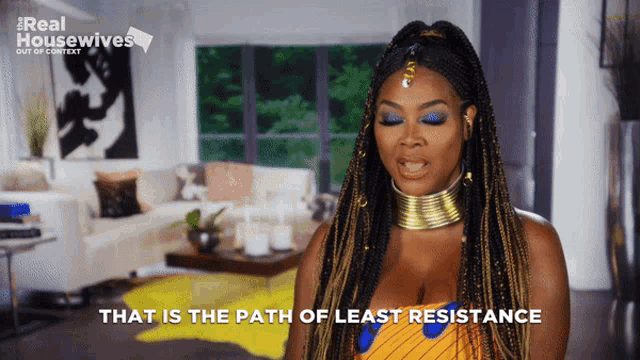 a woman says " that is the path of least resistance " in front of a living room