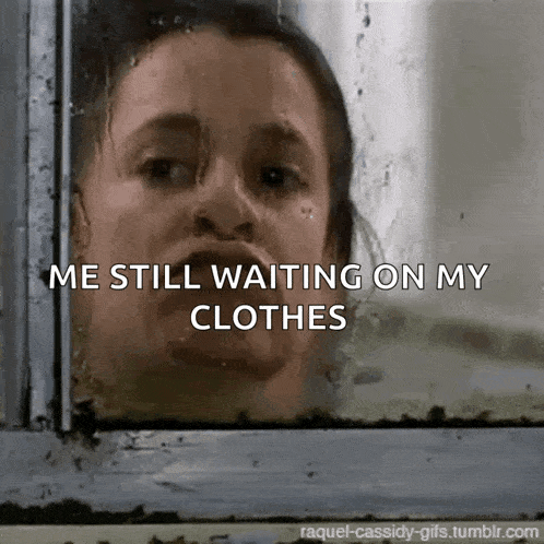 a woman is looking out a window with the words " me still waiting on my clothes " below her