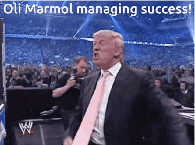 a picture of a man in a suit and tie with the words oli marmol managing success