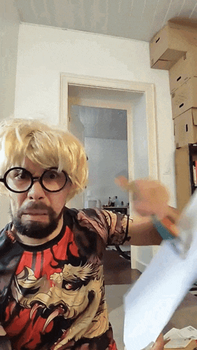 a man wearing a wig and glasses holds a piece of paper in his hand