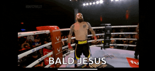 a man in a boxing ring with the word bald jesus on the bottom