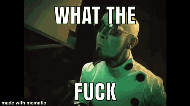 a bald man in a lab coat and glasses is making a funny face with the words `` what the fuck '' .