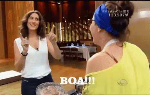 two women are standing next to each other and one of them is wearing a yellow shirt that says boa