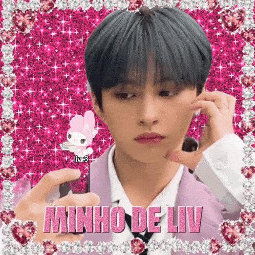 a picture of minho de liv taking a picture of himself with his phone