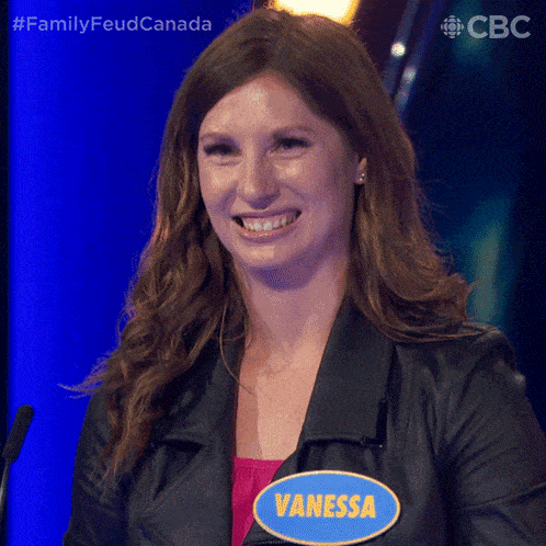 a woman wearing a leather jacket has a name tag that says vanessa