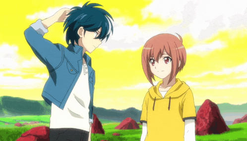a boy and a girl are standing next to each other