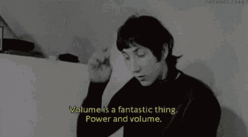a black and white photo of a man saying volume is a fantastic thing . power and volume .