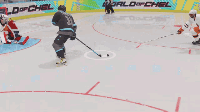 a hockey game is being played in front of a world of chel advertisement